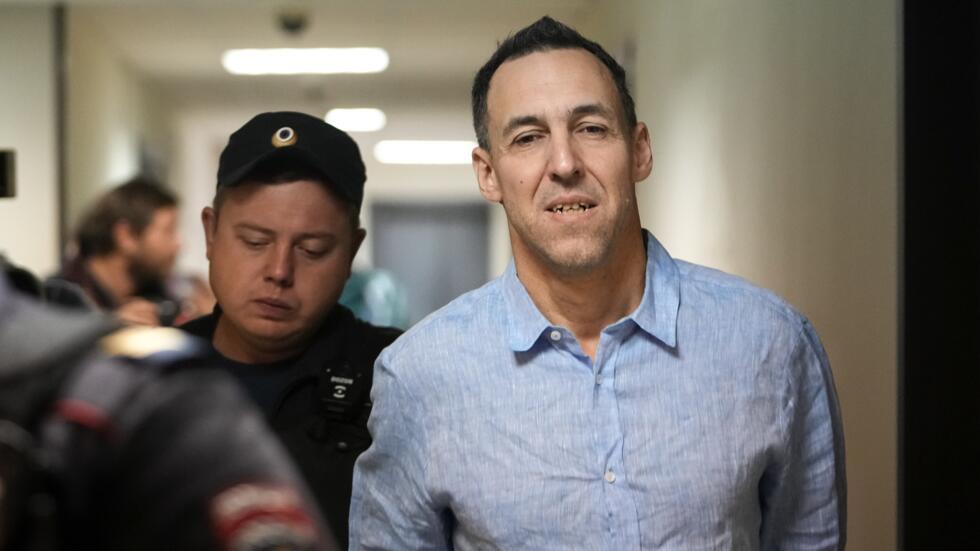 French researcher Laurent Vinatier is escorted to a court room at the Zamoskvoretsky District Court in Moscow, Russia, on 14 October, 2024.