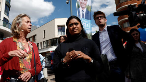 Government spokesperson Prisca Thevenot (centre) with her deputy Virginie Lanlo were among those attacked while out putting up campaign posters on Wednesday.