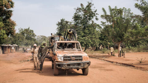 Militiamen of the armed Coalition of Patriots for Change in the southeastern village of Niakari, the front line with the Central African army and its allies, in January 2021.