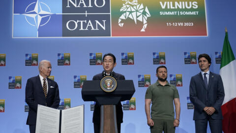Japan's Prime Minister Fumio Kishida, joined by from left, President Joe Biden Ukraine's President Volodymyr Zelenskyy, and Canada's Prime Minister Justin Trudeau, speaks, during an event with G-7 lea