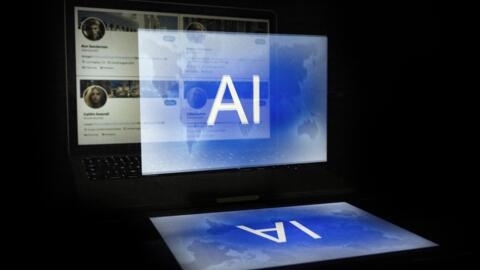 This illustration photograph taken in Helsinki on June 12, 2023, shows an AI (Artificial Intelligence) logo blended with four fake social media accounts 