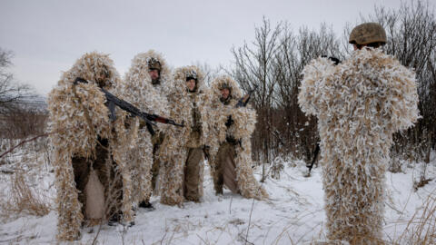 Ukrainian servicemen of the 93rd separate mechanized brigade wear ghillie suits during training near the front line in the Donetsk region, amid Russia’s attack on Ukraine, December 25, 2023.