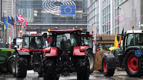 Farmers' tractors are stationed in front of the European Parliament during a protest called by the farmers' organizations "Federation Unie de Groupements d'Eleveurs et d'Agriculteurs" (FUGEA), Boerenf