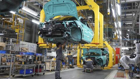 Workers assemble electric cars at a Vinfast factory in Hai Phong, Vietnam, on Sept. 29, 2023.