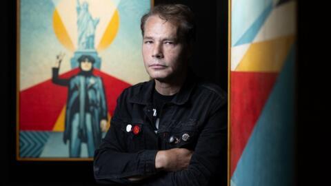 American contemporary artist, activist and founder of OBEY Clothing Shepard Fairey, poses for photographs during an exhibition at the "Itinerrance Gallery" in Paris on 20 June, 2024.