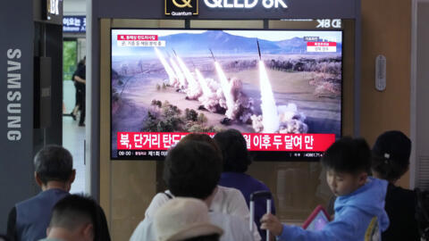 A TV screen shows a file image of North Korea's missiles launch during a news program at Seoul Railway Station in Seoul, South Korea, Thursday, Sept. 12, 2024.