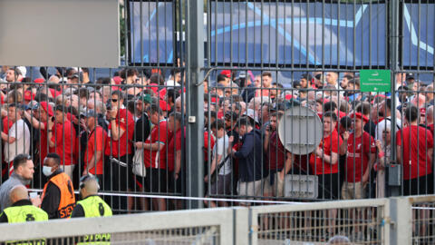 Locked out: Liverpool fans waiting to get into the Stade de France before the match against Real Madrid on Saturday.