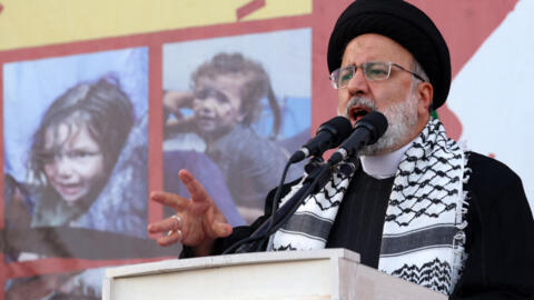 Iranian President Ebrahim Raissi addresses a crowd gathered to protest in Tehran in support of the Palestinians in Gaza, 18 October 2023.