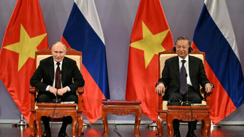 Russia's President Vladimir Putin and Vietnam's President To Lam take part in an event attended by the Vietnam Friendship Association and generations of Vietnamese alumni that studied in Russia at the