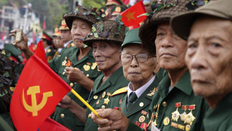 Veterans attend a parade commemorating the victory of Dien Bien Phu battle in Dien Bien Phu, Vietnam, Tuesday, May 7, 2024. Vietnam is celebrating the 70th anniversary of the battle of Dien Bien Phu,