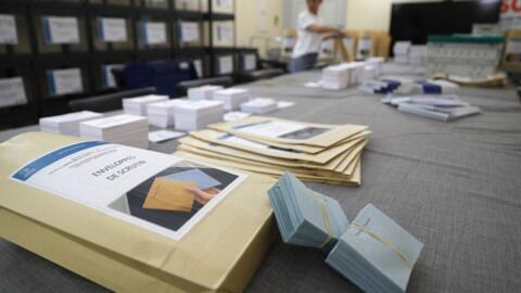 This photograph shows piles of ballot papers at the Ajaccio's mayor house in preparation of French legislative elections of the June 30, 2024, on the French Mediterranean island of Corsica, on 25 June, 2024. 