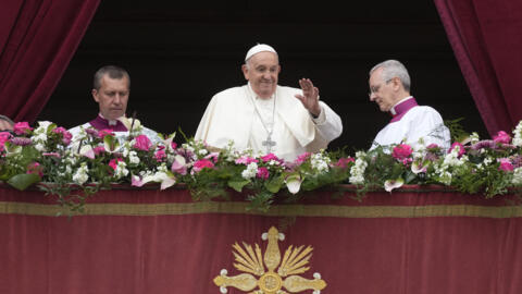 Pope Francis waves from the central lodge of the St. Peter's Basilica prior to the 'Urbi et Orbi' blessing, at the Vatican, Sunday, 31 March, 2024. 