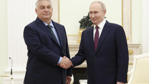 Russian President Vladimir Putin, right, and Hungarian Prime Minister Viktor Orban shake hands during a meeting in Moscow, Russia, Friday, July 5, 2024. 