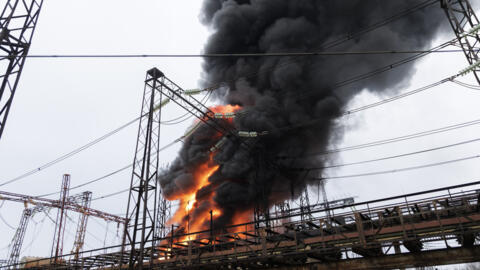 Flames and smoke rise from a blaze at an electricity facility after a Russian attack in Kharkiv, Ukraine, Friday March 22, 2024.