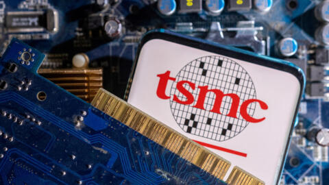 FILE PHOTO: A smartphone with a displayed TSMC (Taiwan Semiconductor Manufacturing Company) logo is placed on a computer motherboard in this illustration taken March 6, 2023. REUTERS/Dado Ruvic/Illustration/File Photo