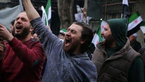 Salah Alashkar protesting in Aleppo city in 2015