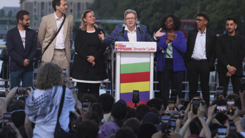 Far-left La France Insoumise - LFI - (France Unbowed) founder Jean-Luc Melenchon, center, delivers a speech after the second round of the legislative elections Sunday, July 7, 2024 in Paris