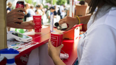 Plastic cups from Coca-Cola at the 2024 Olympics drinks stands at Roland-Garros.