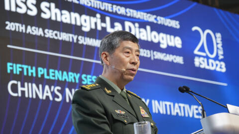 Chinese Defense Minister Gen. Li Shangfu delivers his speech on the last day of the 20th International Institute for Strategic Studies (IISS) Shangri-La Dialogue, Asia's annual defense and security forum, in Singapore, Sunday, June 4, 2023. (AP Photo/Vincent Thian) 李尚福在香格里拉对话上发表讲话