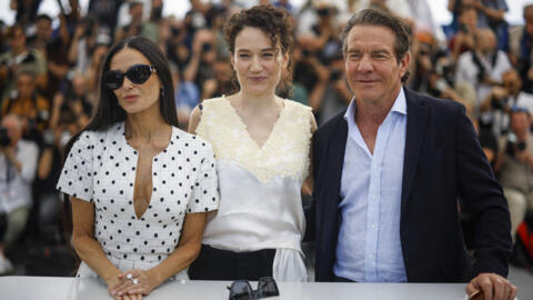 Director Coralie Fargeat, cast members Demi Moore and Dennis Quaid pose during a photocall for the film "The Substance" in competition at the 77th Cannes Film Festival in Cannes, France, May 20, 2024.