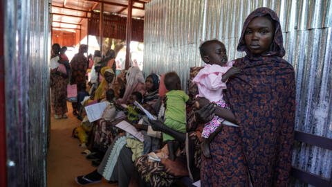 A woman and her baby at the Zamzam displacement camp, close to El Fasher in North Darfur, Sudan,   in January 2024.