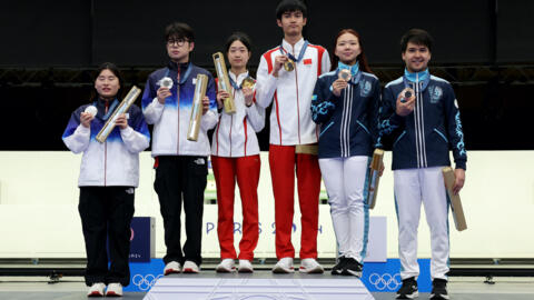 The first gold medallists of the 2024 Olympic Games in Paris, Yuting Huang and Lihao Sheng of China, who won the 10m air rifle mixed team event on 27 July 2024.