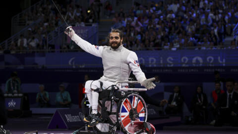 Dimitri Coutya from Britain won his first Paralympic gold medal in wheelchair fencing in the men's category B foil with a 15-7 victory over Yanke Feng from China.