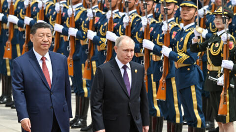 Russian President Vladimir Putin and Chinese President Xi Jinping attend an official welcoming ceremony in Beijing, China May 16, 2024.