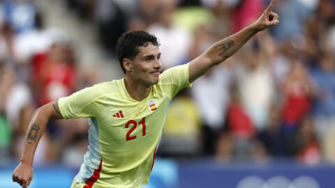 Sergio Camello scored twice in extra-time to give Spain a 5-3 victory over France on 9 August in the final of the men's Olympic football competition.