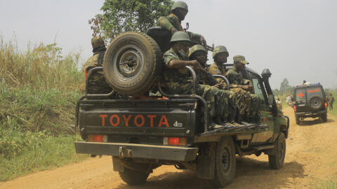 File photo of vehicles of FARDC (Armed Forces of the Democratic Republic of Congo) soldiers escort civilian vehicles transporting goods from Beni towards Komanda.