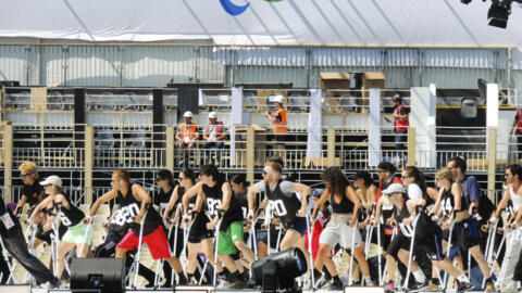 Dancers use crutches during the rehearsal of the Paralympic Games opening ceremony at Place de la Concorde, on 26 August 2024.