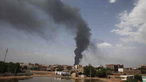 Smoke rising over Khartoum, Sudan, as fighting between the Sudanese army and the paramilitary RSF continues. The two sides have agreed to return to negotiations in Jeddah.