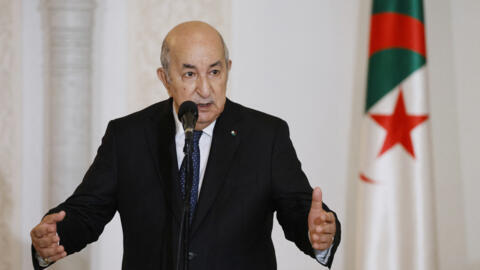 Algeria's President Abdelmadjid Tebboune during a ceremony in the pavilion of honour at Algiers airport, in Algiers, on 27 August 2022.