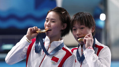 Yuxi Chen (left) Hongchan Quan of China annihilated the opposition to claim the gold medal in the Olympic women's synchronised 10m platform event.