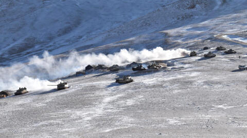 In this file photo provided by the Indian Army, tanks pull back from the banks of Pangong Tso lake region, in Ladakh along the India-China border on Feb. 10, 2021.