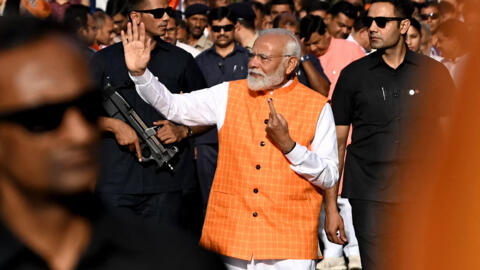 India's Prime Minister Narendra Modi, leader of the ruling Bharatiya Janata Party (BJP) leaves after casting his ballot at a polling booth at Ranip, Ahmedabad on 7 May 2024.