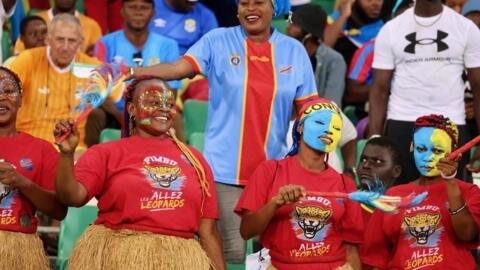 Supporters from the Democratic Republic of Congo celebrate their team's progress to the semi-final at the 2023 Africa Cup of Nations.