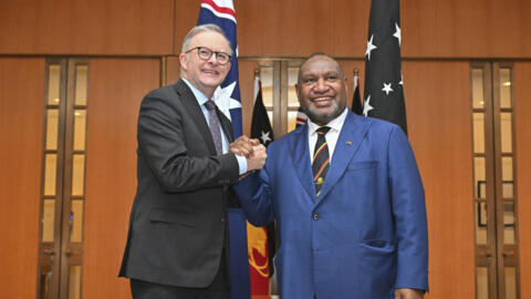 Australia's Prime Minister Anthony Albanese, left, meets with Papua New Guinea's Prime Minister James Marape at Parliament House in Canberra, Australia, Thursday, Dec. 7, 2023. The Australian governme