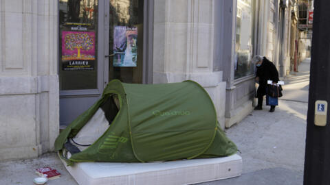 A homeless tent in front of a building in Paris. Housing advocates warn that a record number of people face evictions in 2024 and many could end up sleeping rough.