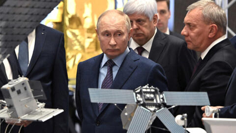 Russia's President Vladimir Putin, accompanied by head of the Roscosmos space corporation Yuri Borisov, visits the centre of the Rocket and Space Corporation "Energia" in Korolyov outside Moscow, Russ