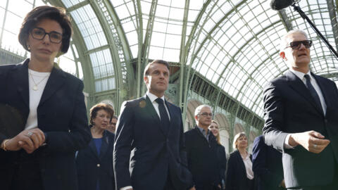 French President Emmanuel Macron (centre) at the Grand Palais, 15 April 2024,100 days ahead of the start of the Paris 2024 Olympic Games.