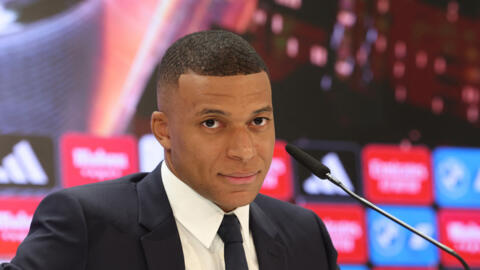 L'attaquant français Kylian Mbappé lors de sa première conférence de presse en tant que joueur du Real Madrid le 16 juillet 2024. Deux semaines plus tard, il devient l'actionnaire majoritaire du SM Caen, un club de Ligue 2. (Image d'illustration).