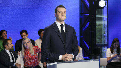 French far-right Rassemblement National (National Rally) party President Jordan Bardella poses prior to a debate broadcasted on French TV channel TF1, in Boulogne-Billancourt, outside Paris, Tuesday,