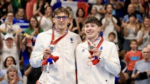 Alex Portal (left) won silver in the men's 400m freestyle S13 and his 17-year-old brother, Kylian, claimed the bronze.