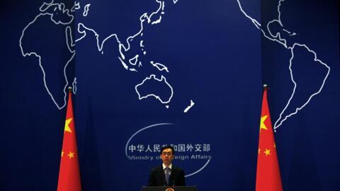 China's Foreign Ministry spokesman Liu Weimin listens to a question during a news conference in Beijing November 21, 2011. 