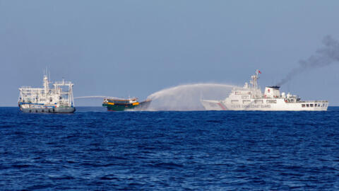 Chinese Coast Guard vessels fire water cannons towards a Philippine resupply vessel Unaizah May 4 on its way to a resupply mission at Second Thomas Shoal in the South China Sea, March 5, 2024.