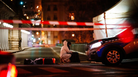 A forensic police officer works at the scene of a stabbing in Paris on December 2, 2023. A person known to the French authorities as a radical Islamist with mental health troubles stabbed a German tourist to death and wounded two people in central Paris on 2 December before being arrested.