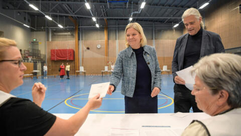 Swedish Social Democratic Party leader Magdalena Andersson with her husband Richard Friberg vote in the European Parliament election in Skuru sports hall in Nacka, Stockholm, Sweden, on June 9, 2024.