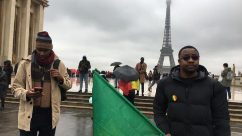 French Senegalese citizens protesting in Paris for their democratic rights in February 2024.