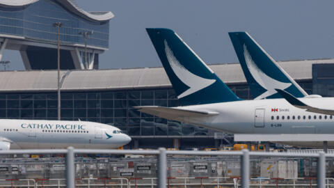 Cathay Pacific aircraft are seen parked at Hong Kong International Airport in Hong Kong, China August 7, 2024.